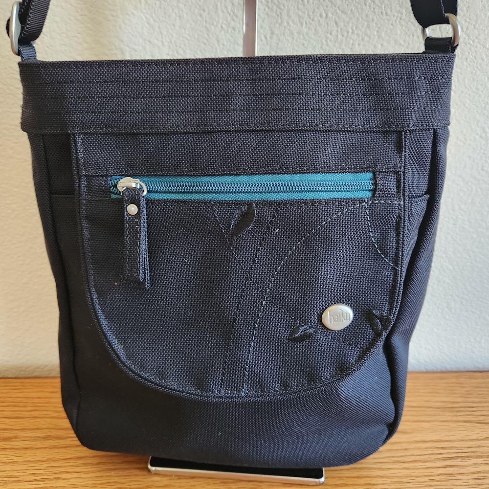 Haiku Black Crossbody Bag with Blue Accent - Picture 2 of 12